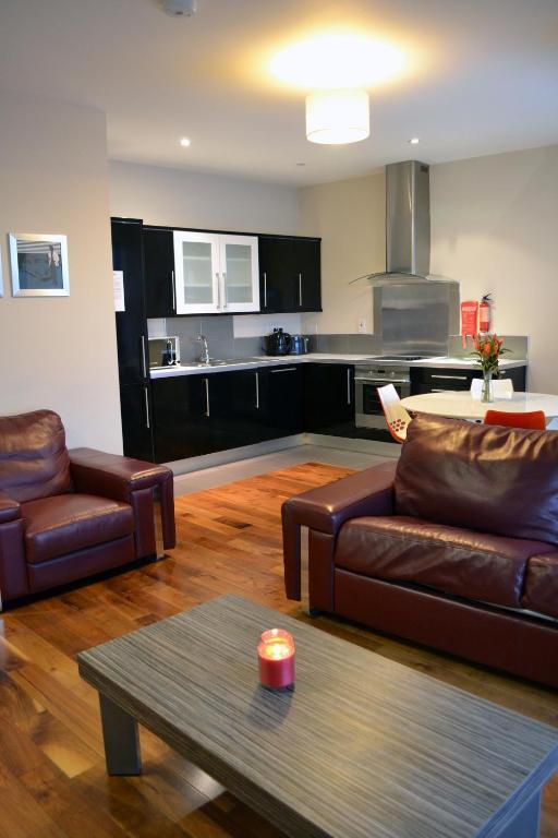 Kuchyň nebo kuchyňský kout v ubytování Carrick Plaza Suites and Apartments