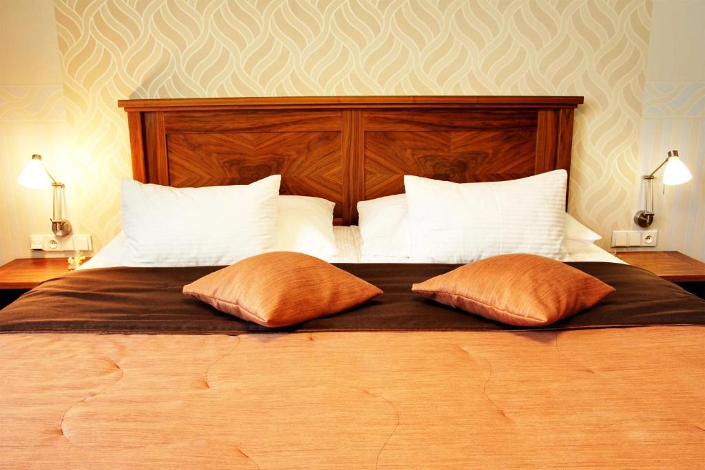 Postel nebo postele na pokoji v ubytování Hotel Baltaci Atrium