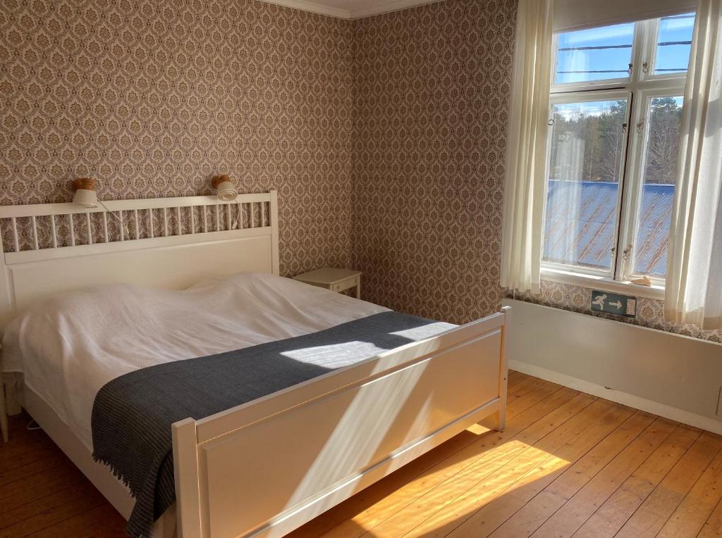 Postel nebo postele na pokoji v ubytování Bruksgården