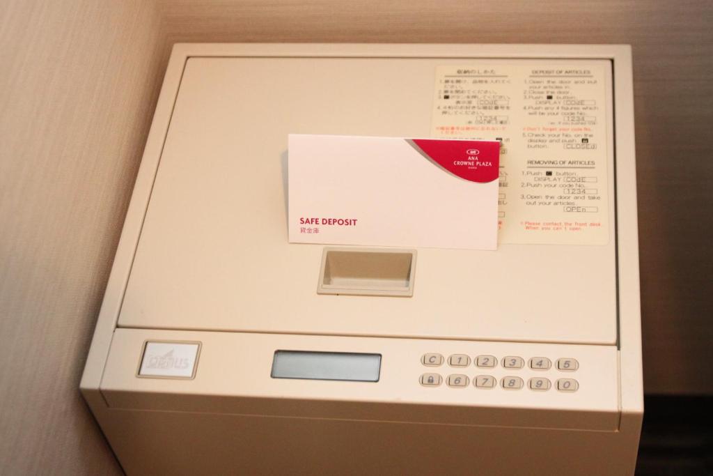 a computer with a box on top of it at ANA Crowne Plaza Hotel Kyoto by IHG in Kyoto