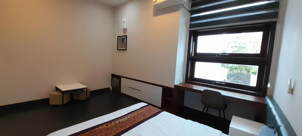 Postel nebo postele na pokoji v ubytování Đồi Sao Homestay