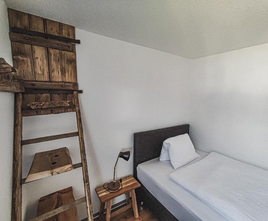 Postel nebo postele na pokoji v ubytování Berghotel Weisshorn