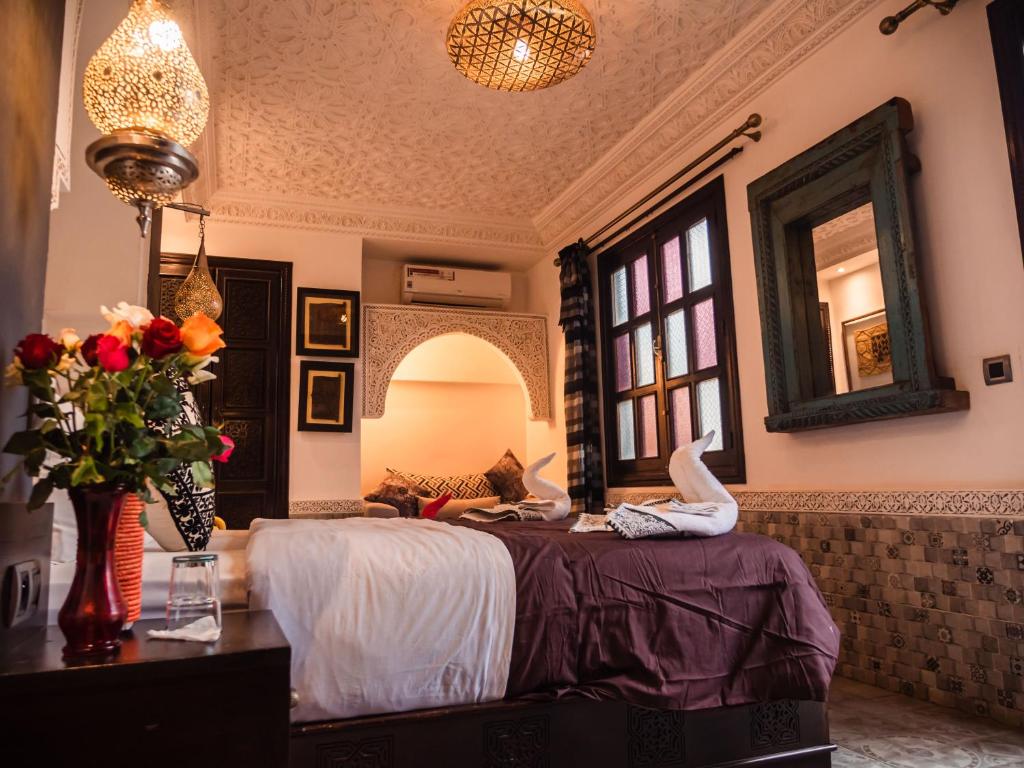 Postel nebo postele na pokoji v ubytování Riad Zagouda