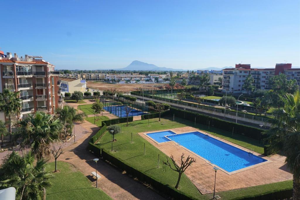 an aerial view of a city with a swimming pool at Nature II in El Verger