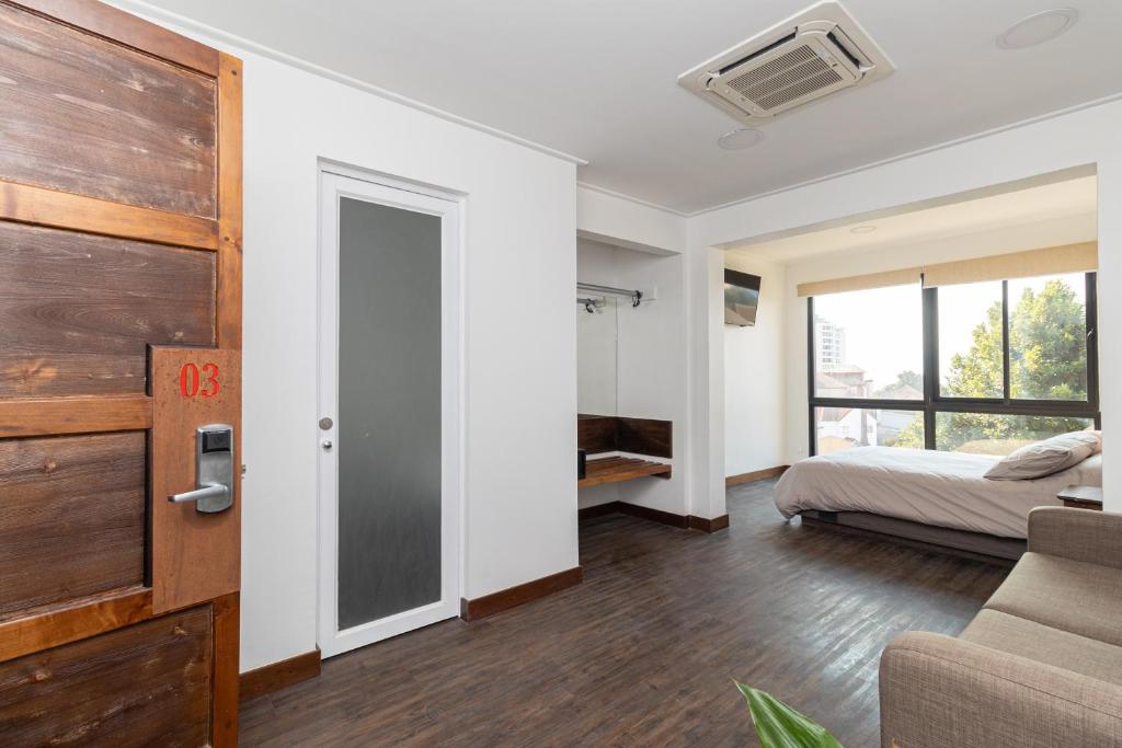Postel nebo postele na pokoji v ubytování Hotel Boutique Ossido Nero