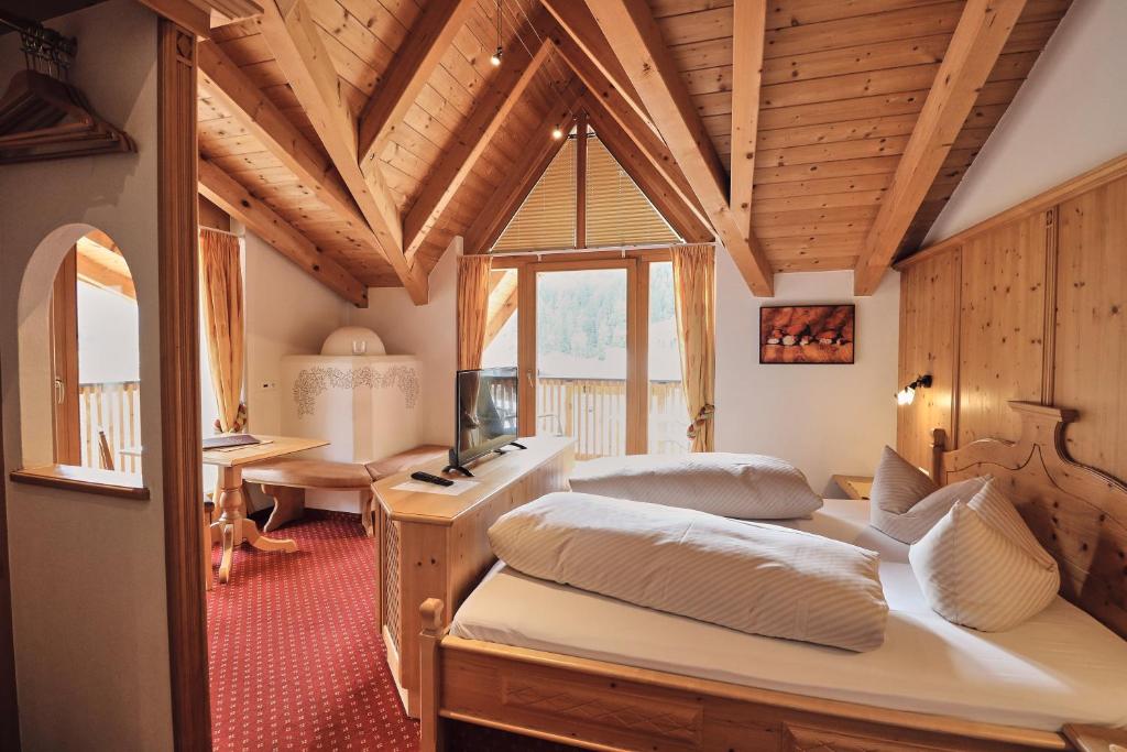 Postel nebo postele na pokoji v ubytování Hotel Traube