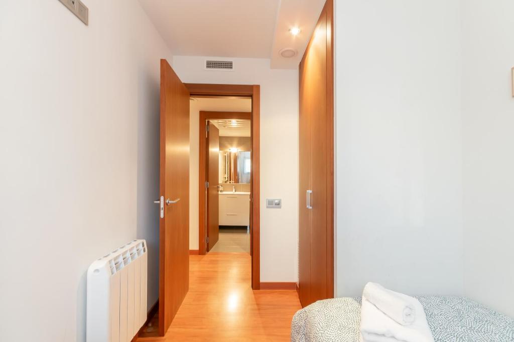 Posteľ alebo postele v izbe v ubytovaní Sant Sebastià Moderno apartamento a 100 metros de la playa
