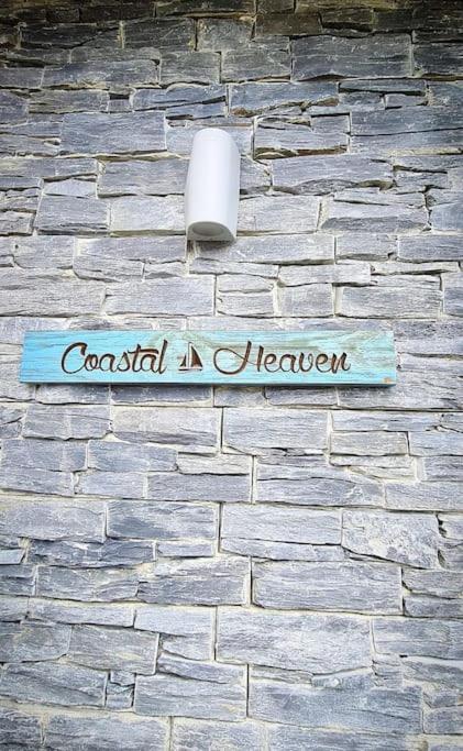 Certifikát, hodnocení, plakát nebo jiný dokument vystavený v ubytování Coastal Heaven Downings