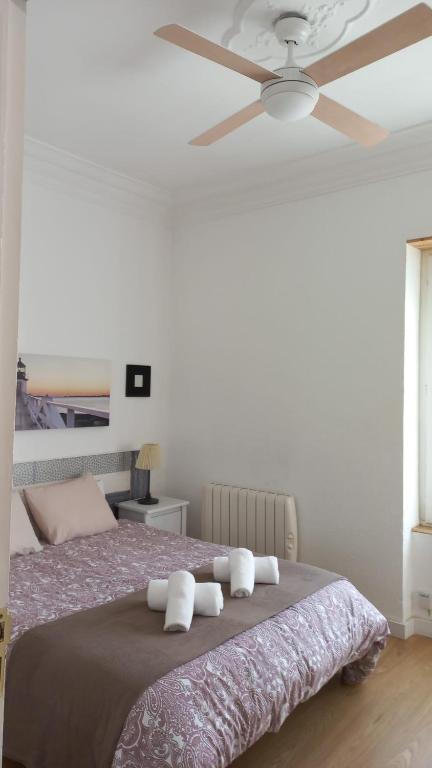 Postel nebo postele na pokoji v ubytování FLORIT FLATS - The Ausias March Apartment
