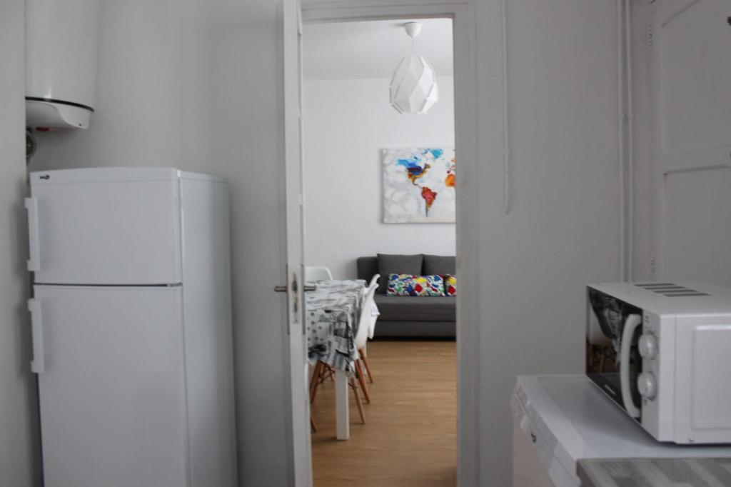 Kuchyň nebo kuchyňský kout v ubytování FLORIT FLATS - The Ausias March Apartment