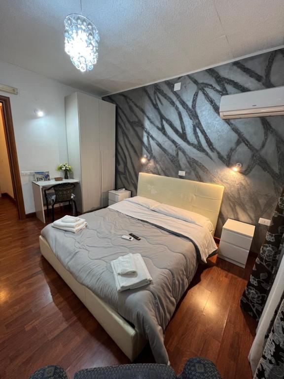 Postel nebo postele na pokoji v ubytování Hotel Como
