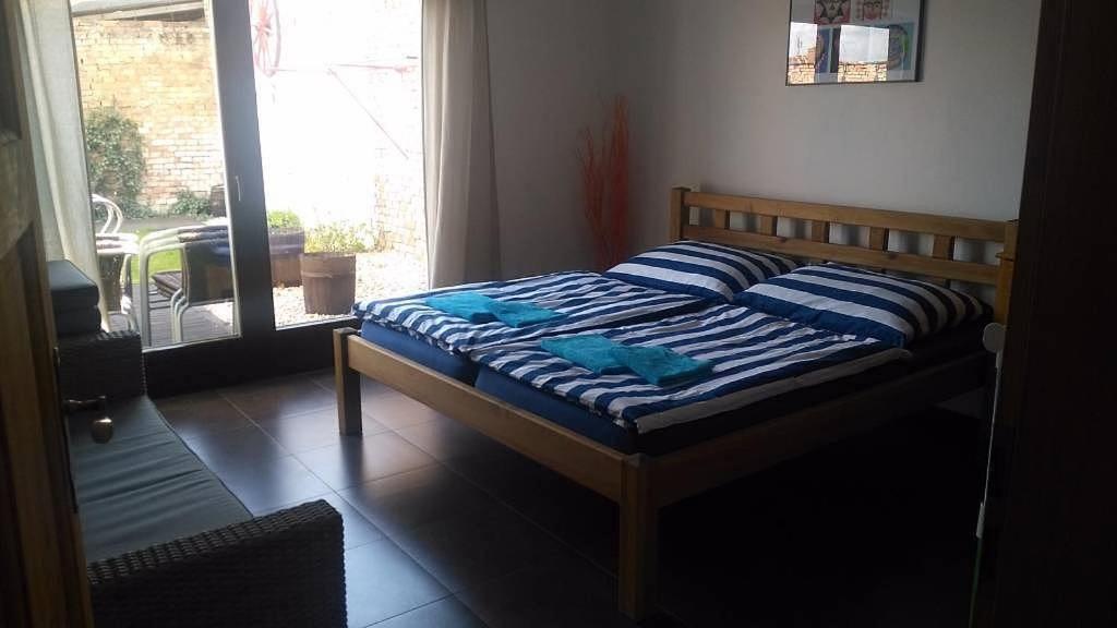 Postel nebo postele na pokoji v ubytování Chalupa U Bednáře