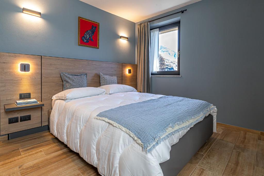 Postel nebo postele na pokoji v ubytování Hotel Mon Émile