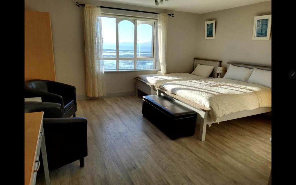 Postel nebo postele na pokoji v ubytování Seashells B&B