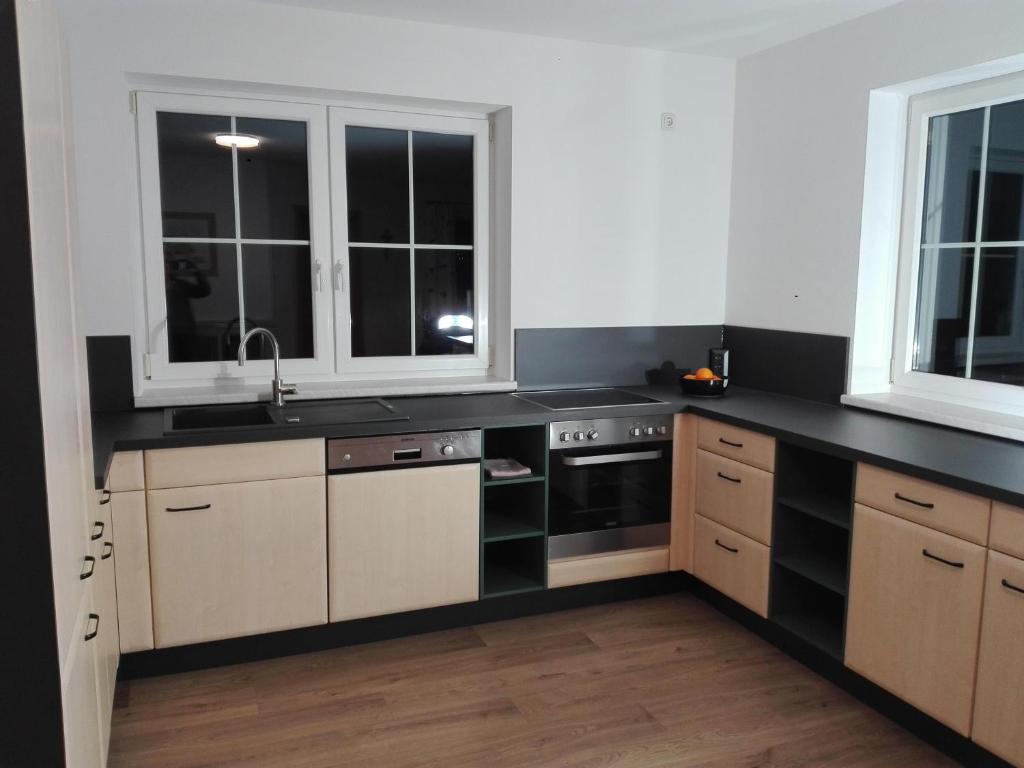 Kuchyň nebo kuchyňský kout v ubytování Appartement Juffinger