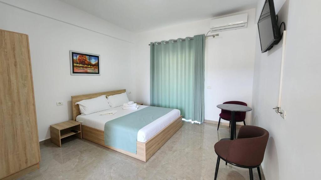 Postel nebo postele na pokoji v ubytování Sweet Hotel