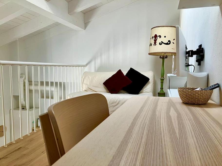 A bed or beds in a room at Deliziosa Casetta a Bologna