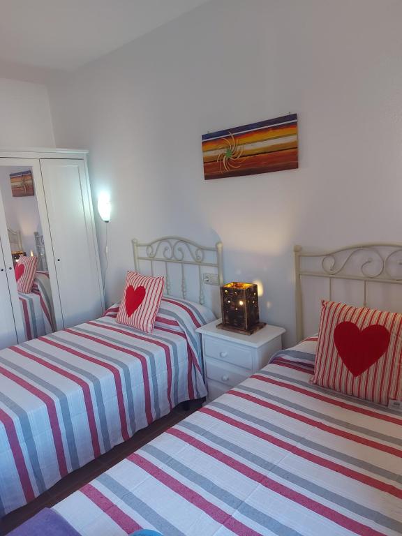 Postel nebo postele na pokoji v ubytování villa Mimosa