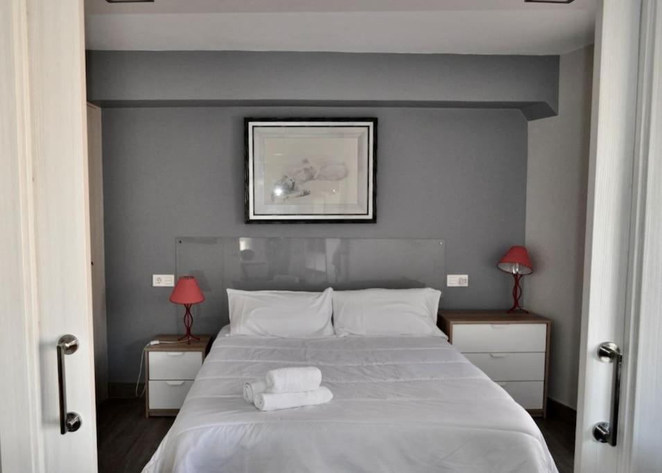 Postel nebo postele na pokoji v ubytování III Apartamento junto a PLAZA MAYOR