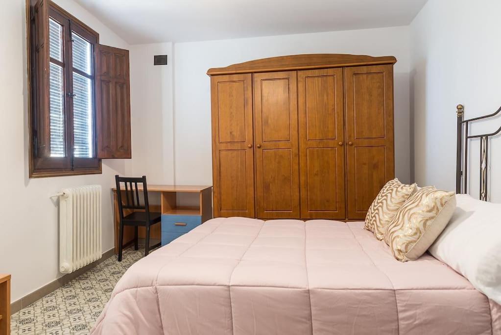 Postel nebo postele na pokoji v ubytování La Casa del Realejo