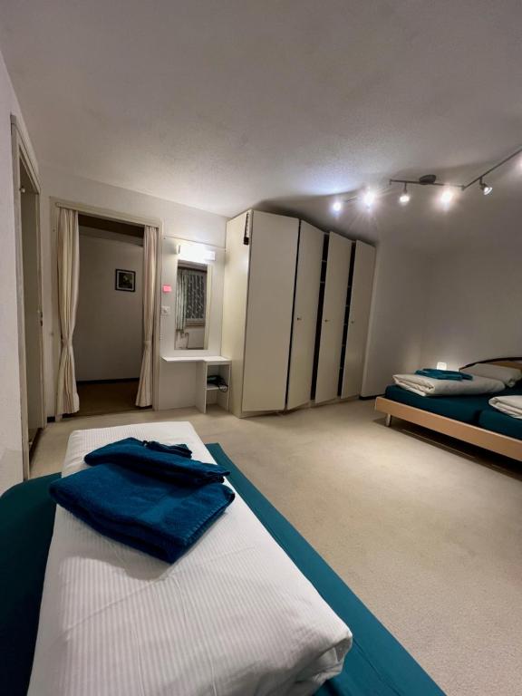 Postel nebo postele na pokoji v ubytování Hotel Péz Ault