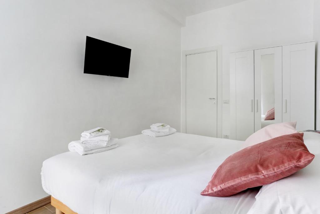 A bed or beds in a room at Casa Di Claudia