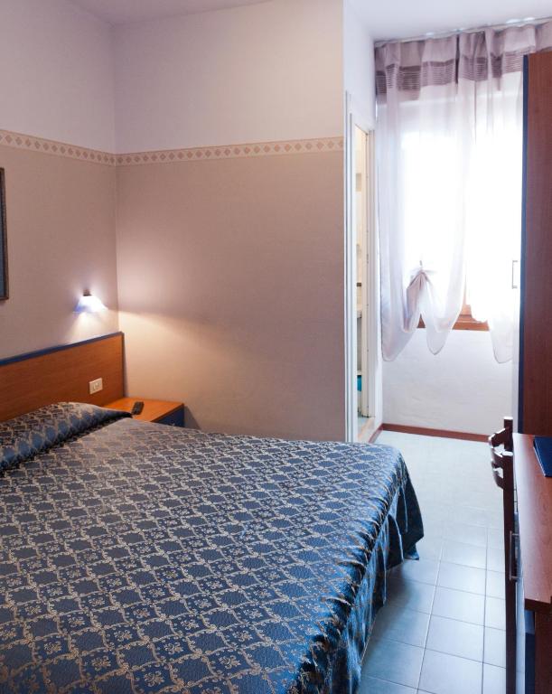 Albergo Marsariにあるベッド