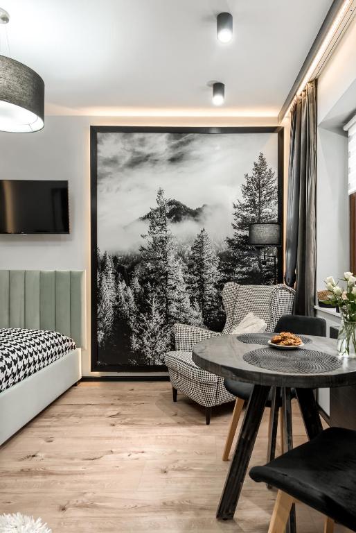 Posedenie v ubytovaní Przytulia Apartamenty i Pokoje