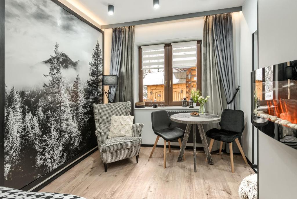 Posedenie v ubytovaní Przytulia Apartamenty i Pokoje