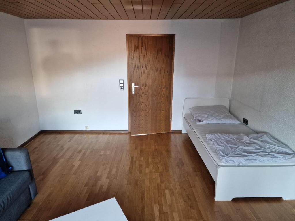 Postel nebo postele na pokoji v ubytování Monteurswohnung Schwarzwald