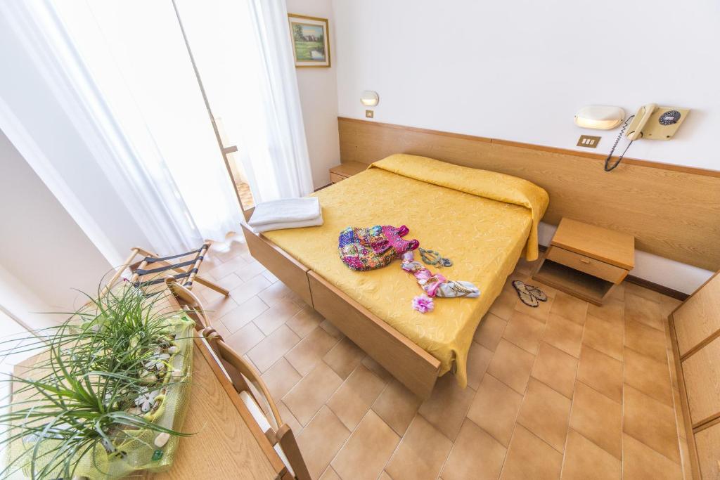 Postel nebo postele na pokoji v ubytování Hotel Touring
