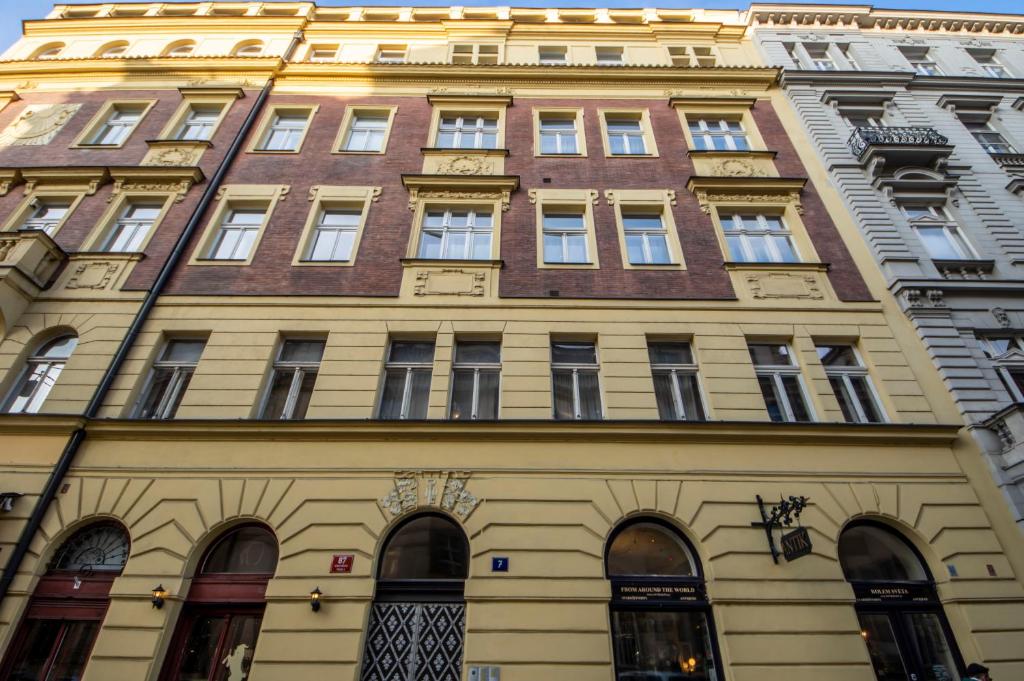 a building on the corner of a street at AUTENTIC APARTMENTS Platnéřská in Prague
