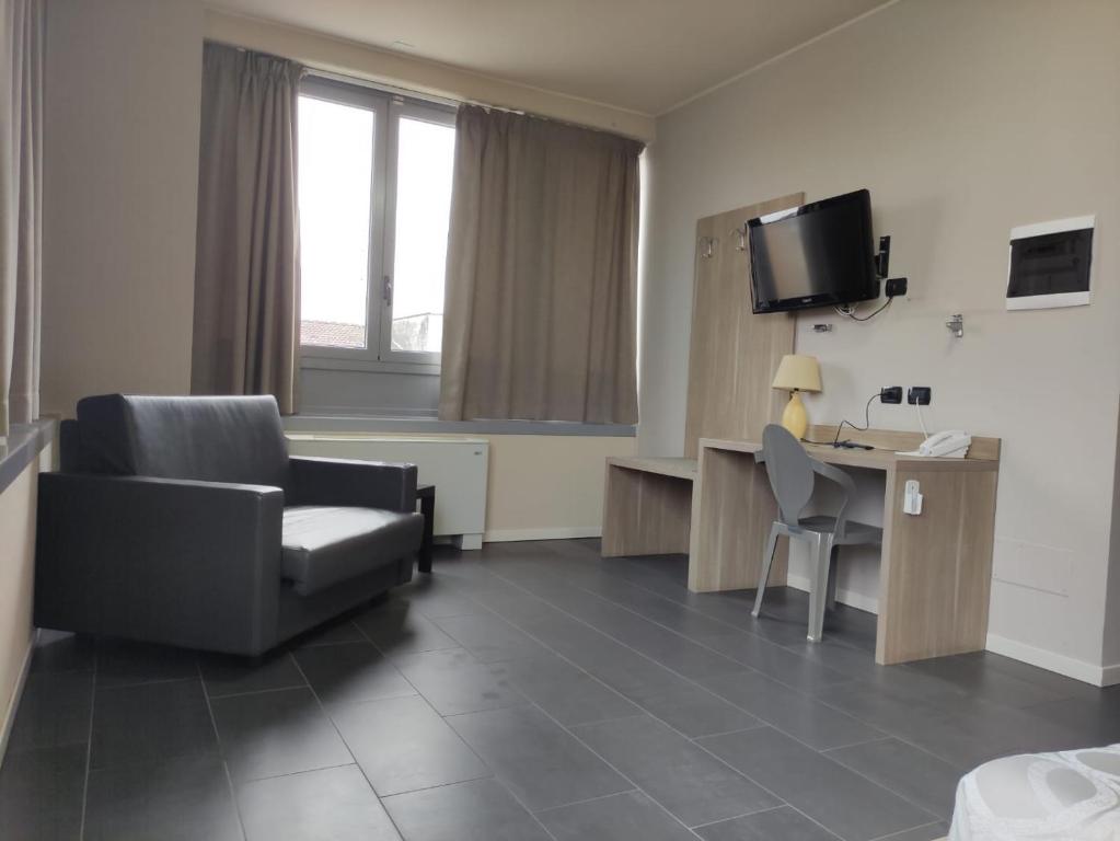 TV a/nebo společenská místnost v ubytování Valtidone Hotel