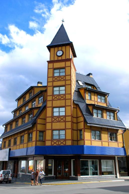 a building with a clock tower on top of it at Viejo lobo 203 in Ushuaia
