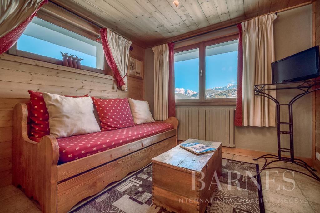 Televízia a/alebo spoločenská miestnosť v ubytovaní Apartments in Chalet Nessa