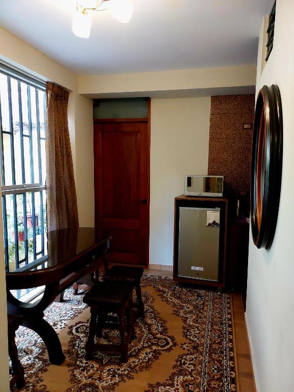 Kuchyň nebo kuchyňský kout v ubytování Zans Apartments Cusco