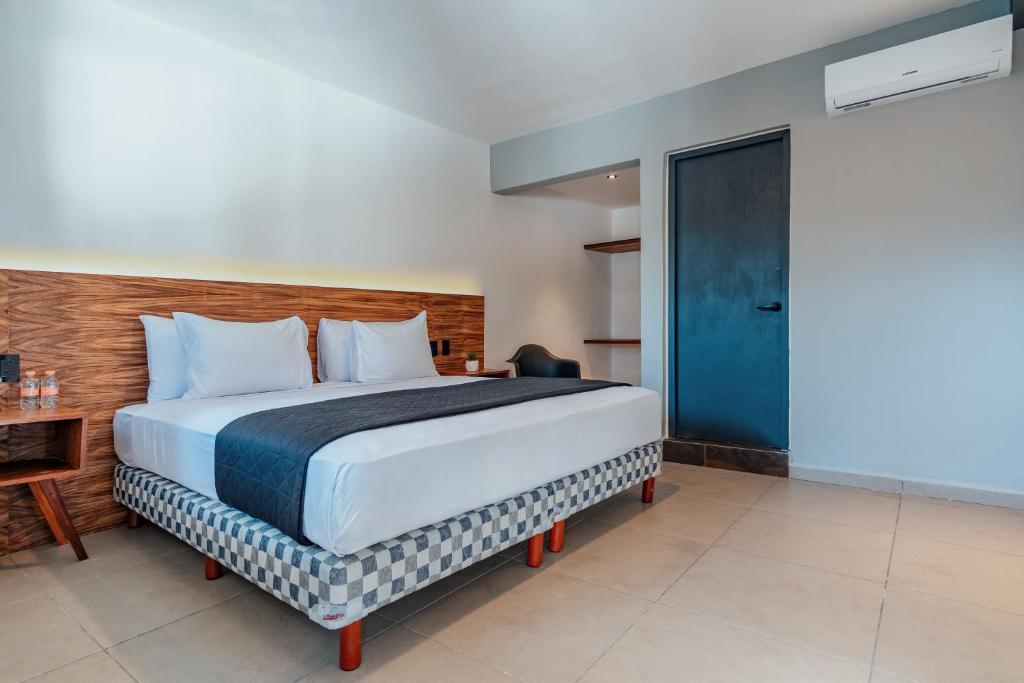 Postel nebo postele na pokoji v ubytování Hotel Mody Merida