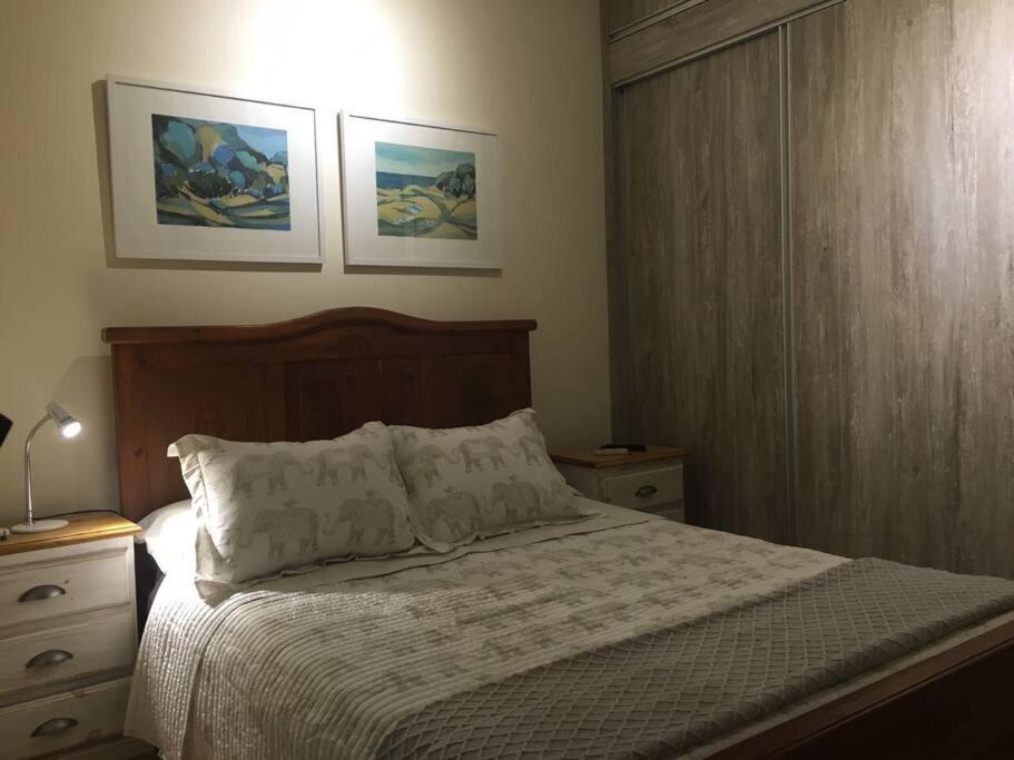 Cama o camas de una habitación en Apto Península bien situado**