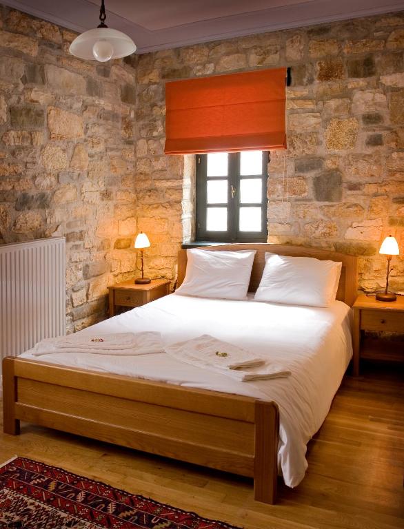 Postel nebo postele na pokoji v ubytování Gaia Guesthouse
