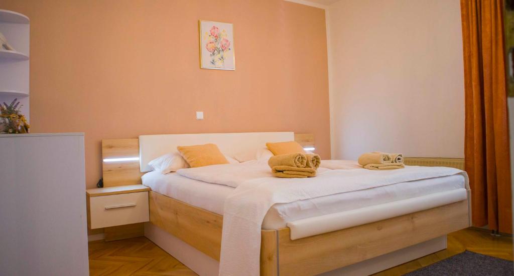 Posteľ alebo postele v izbe v ubytovaní Apartments MM