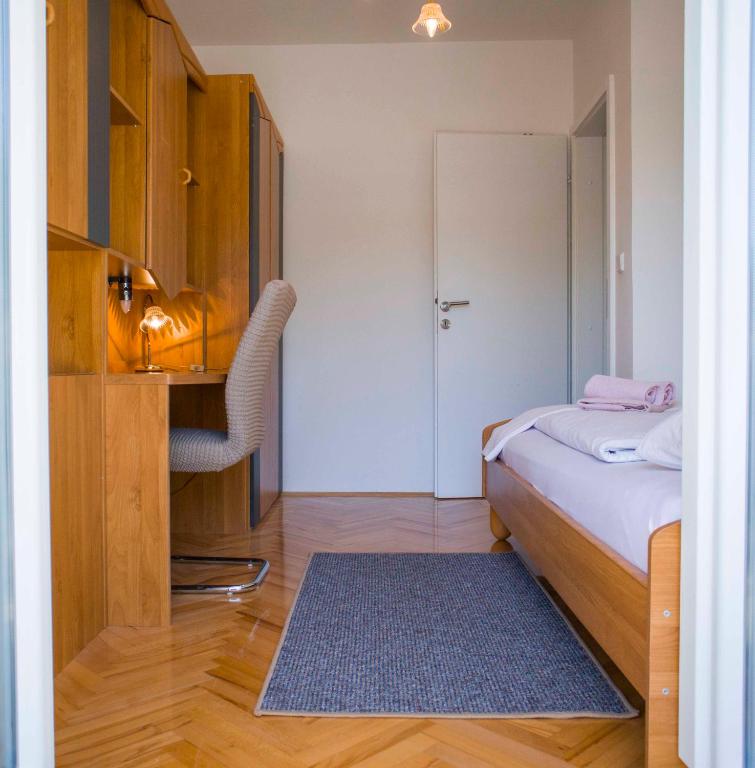 Posteľ alebo postele v izbe v ubytovaní Apartments MM