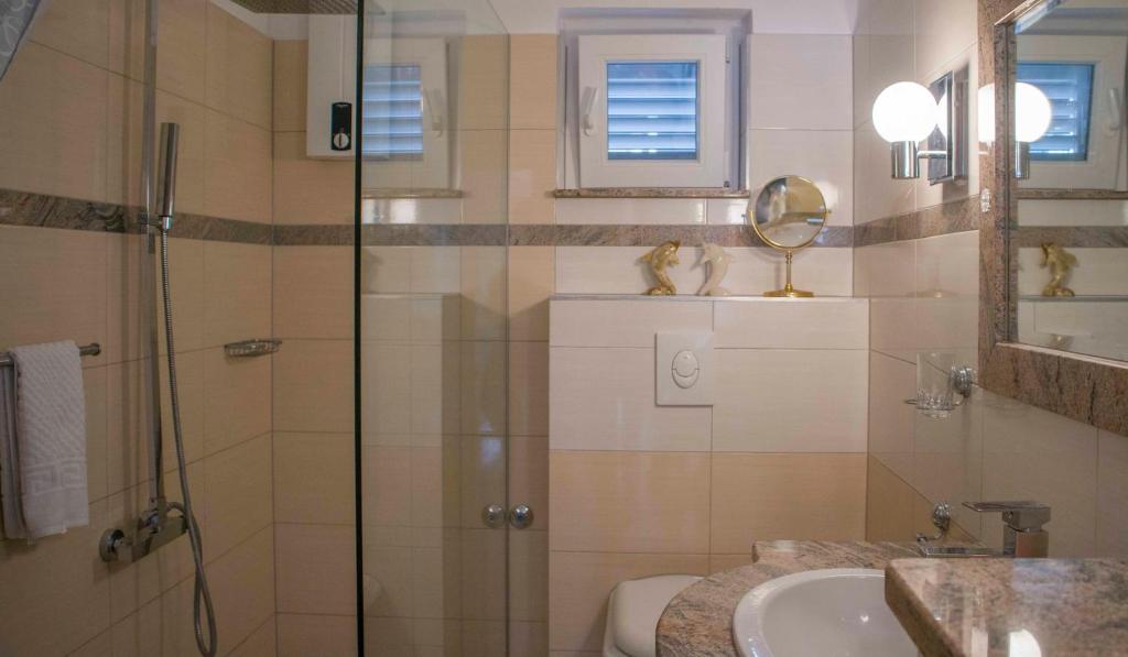 Kúpeľňa v ubytovaní Apartments MM