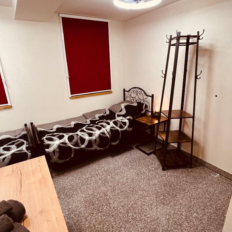 Postel nebo postele na pokoji v ubytování Rose Boardinghouse 24h-7d Self Check-In Automat