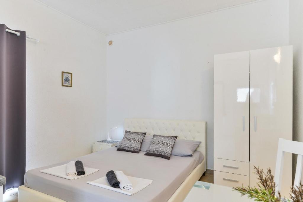 Posteľ alebo postele v izbe v ubytovaní Apartment Liovic