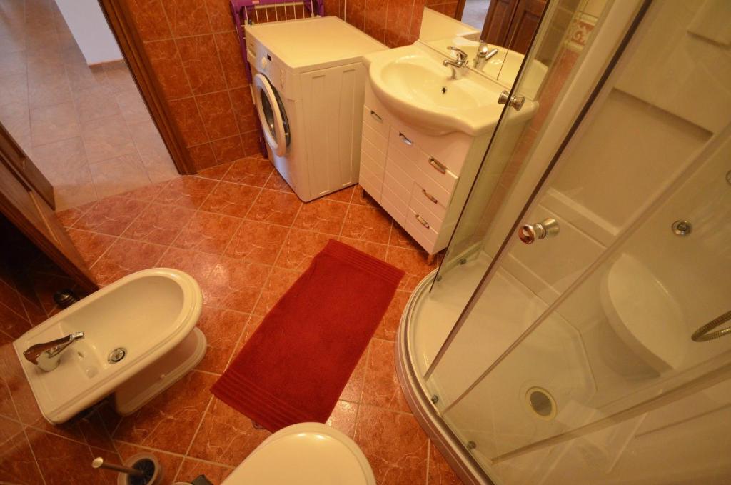 Koupelna v ubytování Apartments Komljen