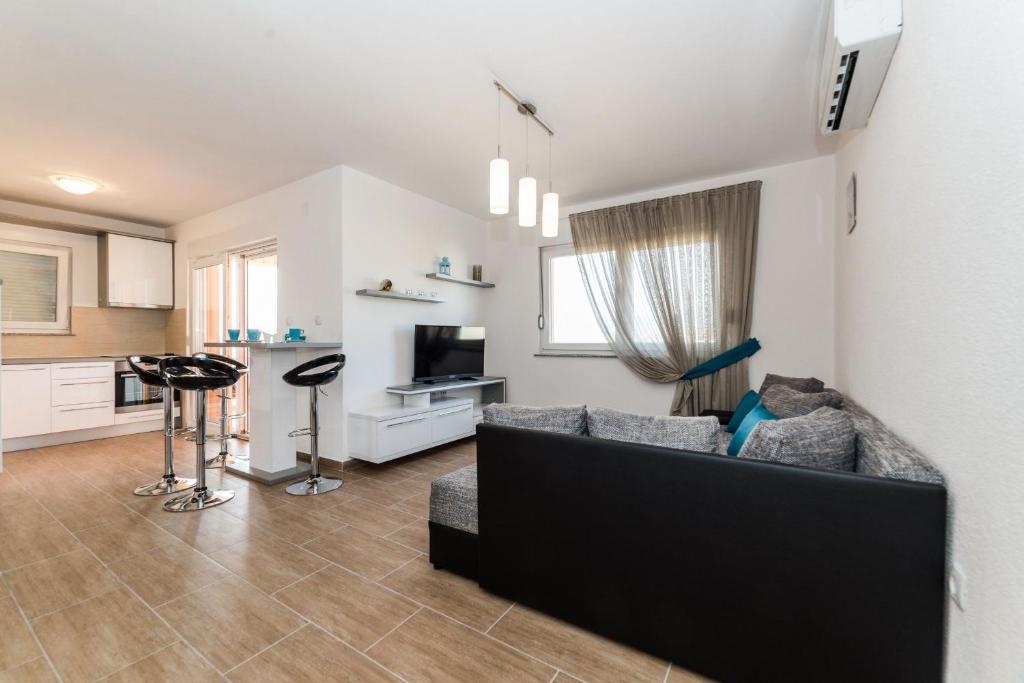 Kuchyň nebo kuchyňský kout v ubytování Apartments Kovacevic