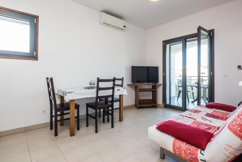 Televízia a/alebo spoločenská miestnosť v ubytovaní Apartment Silverstar