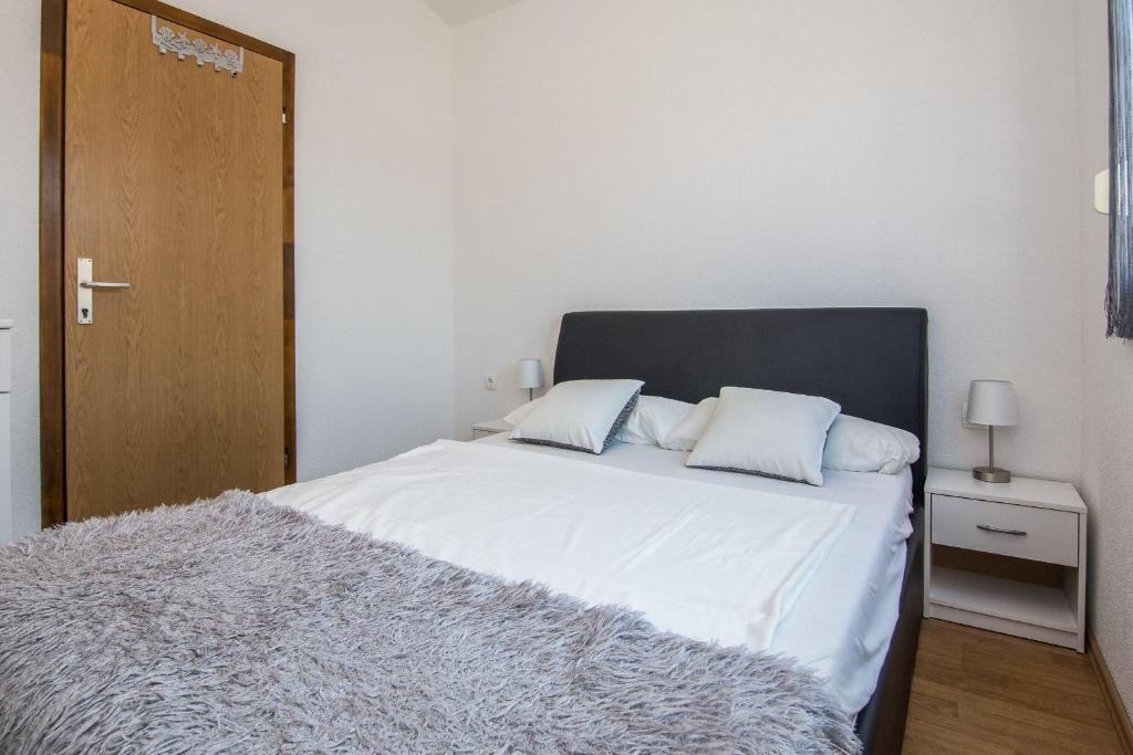 Posteľ alebo postele v izbe v ubytovaní Apartment Wenig