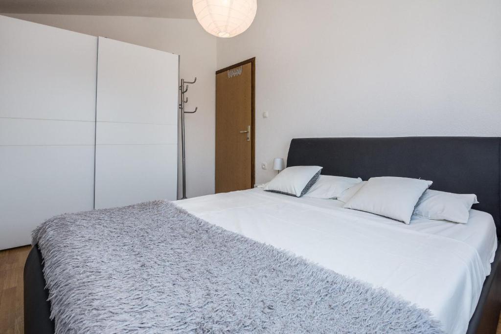 Posteľ alebo postele v izbe v ubytovaní Apartment Wenig