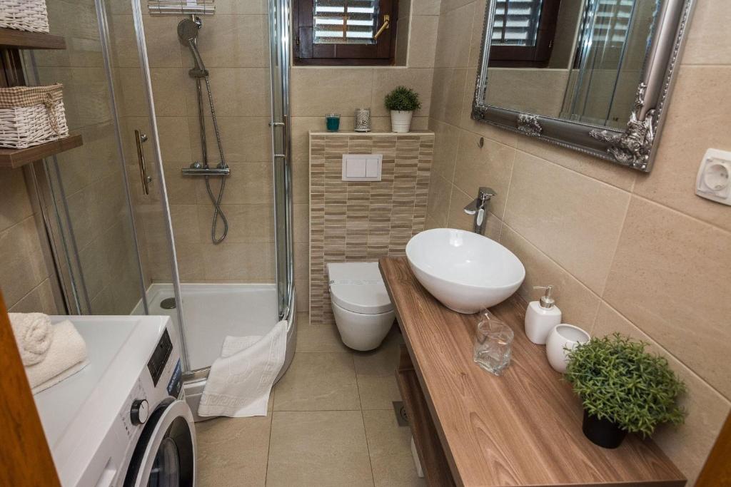 Kúpeľňa v ubytovaní Apartments Malcic